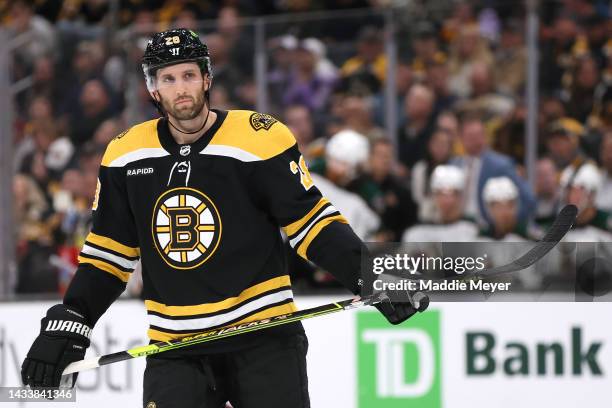 Derek Forbort of the Boston Bruins looks on during the third period against the Arizona Coyotes at TD Garden on October 15, 2022 in Boston,...