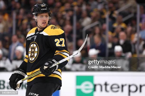 Hampus Lindholm of the Boston Bruins looks on during the first period against the Arizona Coyotes at TD Garden on October 15, 2022 in Boston,...