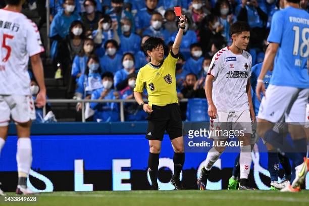 Referee Kouei Koya shows an red card to Keita FUJIMURA of Zweigen Kanazawa during the J.LEAGUE Meiji Yasuda J2 41st Sec. Match between Yokohama FC...
