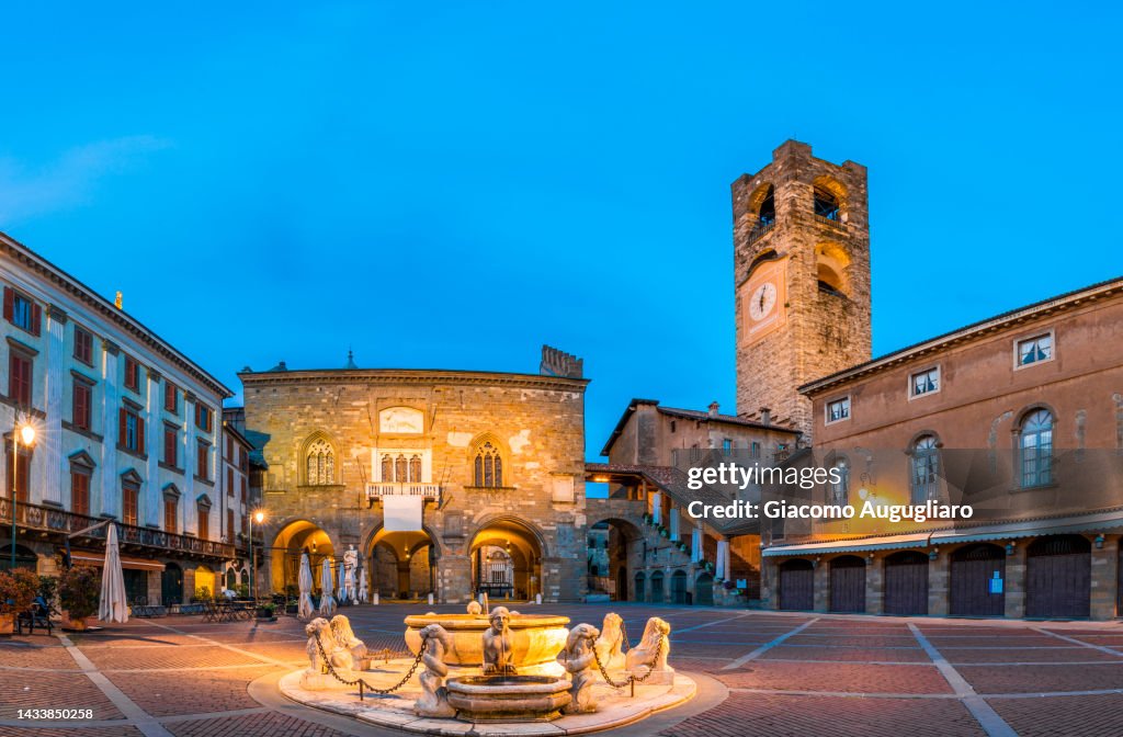 Piazza Vecchia in the upper town of Bergamo at dusk, Bergamo, Lombardy, italy