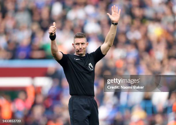 Referee Robert Jones looks on during the Premier League match between Aston Villa and Chelsea FC at Villa Park on October 16, 2022 in Birmingham,...