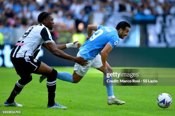 Pedro Rodriguez of SS Lazio compete for the ball with Kingsley Ehizibue of Udinese Calcio during the Serie A match between SS Lazio and Udinese...
