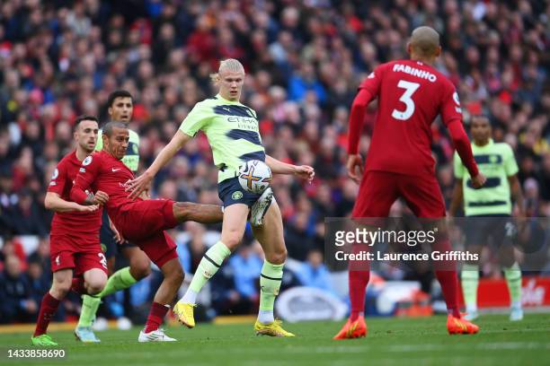Erling Haaland of Manchester City is challenged by Thiago Alcantara of Liverpool during the Premier League match between Liverpool FC and Manchester...