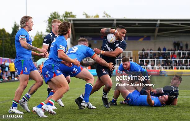 Bayley Liu of Scotland looks to break past Nathan Brown of Italy during Rugby League World Cup 2021 Pool B match between Scotland and Italy at...