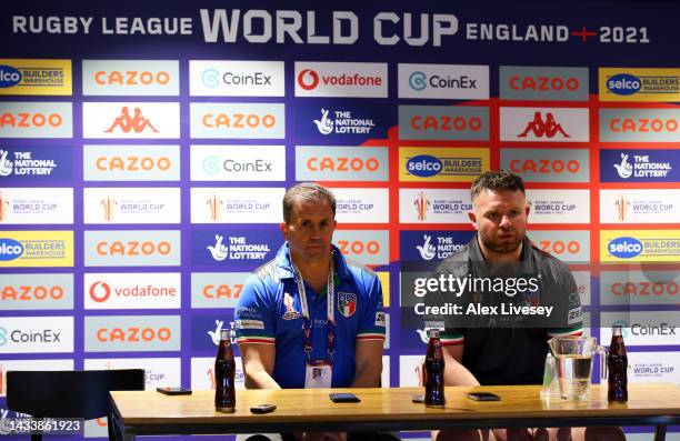 Leo Epifania, Head Coach of Italy and Nathan Brown of Italy look on as they are interviewed following the Rugby League World Cup 2021 Pool B match...