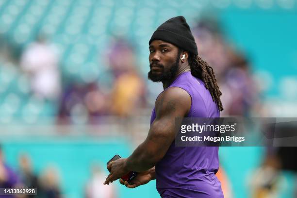 Dalvin Cook of the Minnesota Vikings warms up against the Miami Dolphins at Hard Rock Stadium on October 16, 2022 in Miami Gardens, Florida.