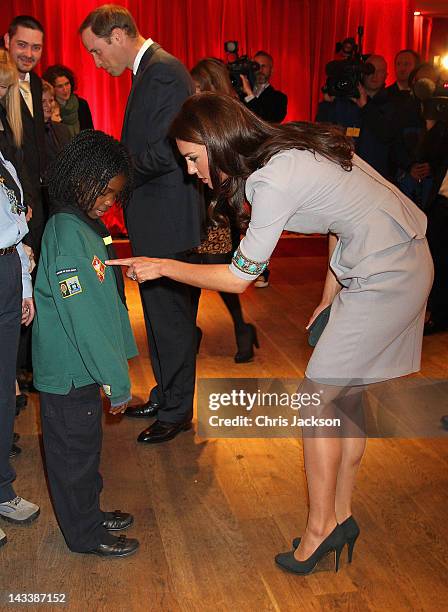 Catherine, Duchess of Cambridge talks to children as she attends the UK Premiere of 'African Cats' in aid of Tusk at BFI Southbank on April 25, 2012...