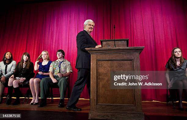 Republican presidential candidate, former Speaker of the House Newt Gingrich walks to the podium to speak to students at Thomas Jefferson Classical...