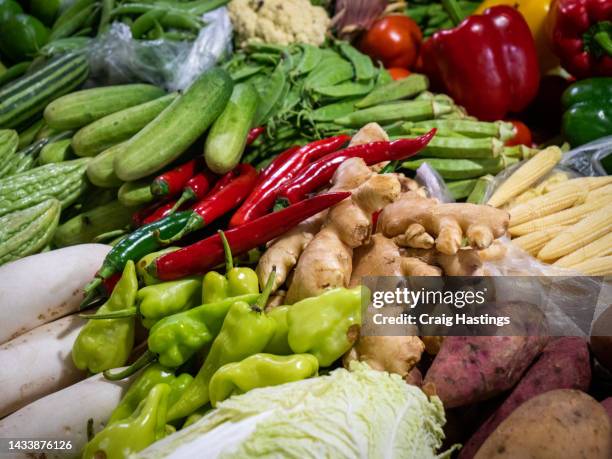 macro extreme close up of fruit, spices and vegetable group. healthy fresh, natural and inexpensive eating concept. - cambodia food stock pictures, royalty-free photos & images