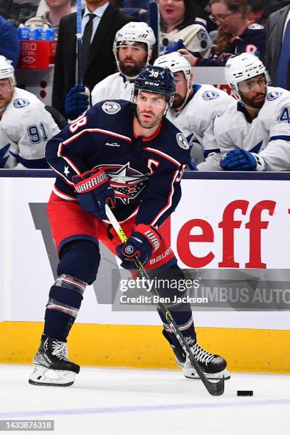 Boone Jenner of the Columbus Blue Jackets skates with the puck during the third period of a game against the Tampa Bay Lightning at Nationwide Arena...