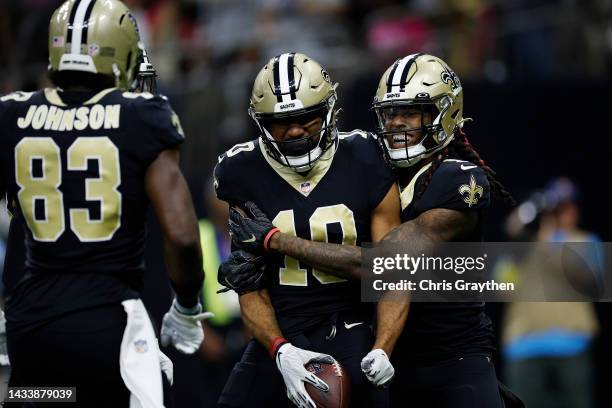 Tre'Quan Smith of the New Orleans Saints celebrates with teammates after catching the ball for a touchdown during the first quarter against the...