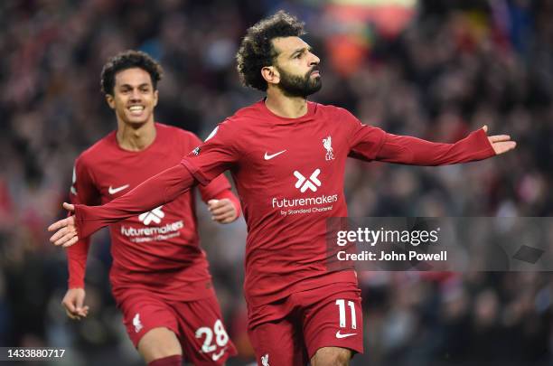 Mohamed Salah of Liverpool celebrates after scoring the first goal during the Premier League match between Liverpool FC and Manchester City at...