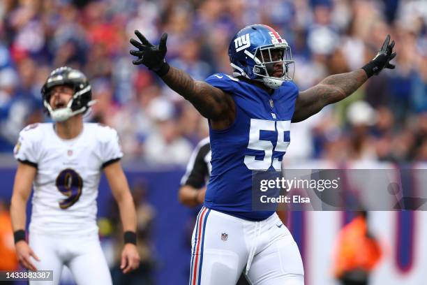 Jihad Ward of the New York Giants celebrates after Justin Tucker of the Baltimore Ravens misses a field goal during the first quarter at MetLife...