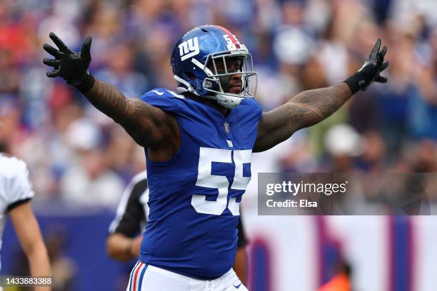 Jihad Ward of the New York Giants celebrates after the Baltimore Ravens miss a field goal during the first quarter at MetLife Stadium on October 16,...