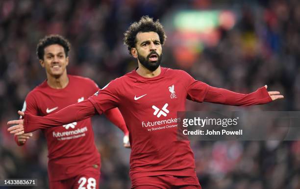 Mohamed Salah of Liverpool celebrates after scoring the first goal during the Premier League match between Liverpool FC and Manchester City at...