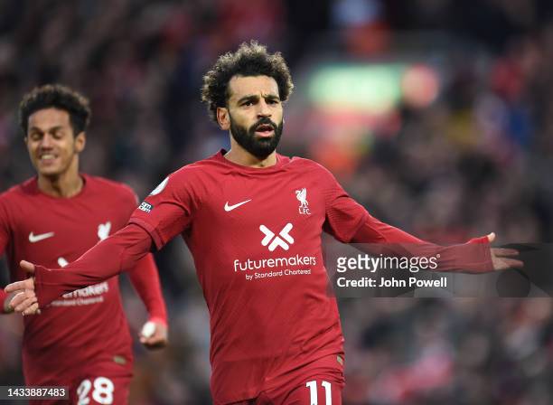 Mohamed Salah of Liverpool celebrates after scoring the first goal during the Premier League match between Liverpool FC and Manchester City at...