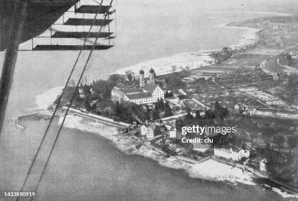 friedrichshafen palace, the summer residence of the württemberg royal family, seen from the airship z ii - friedrichshafen stock illustrations