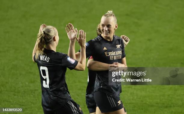 Stina Blackstenius of Arsenal celebrates with Beth Mead and teammates after scoring their team's first goal during the FA Women's Super League match...