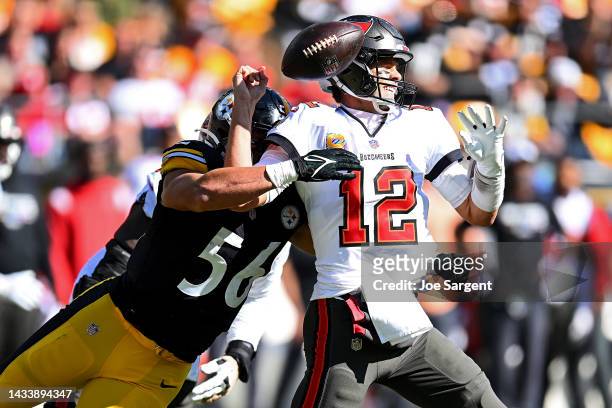 Alex Highsmith of the Pittsburgh Steelers forces a fumble by Tom Brady of the Tampa Bay Buccaneers during the second quarter at Acrisure Stadium on...