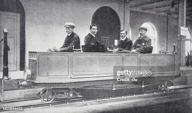 monorail railway, 4 men sitting in it - monorail stock illustrations