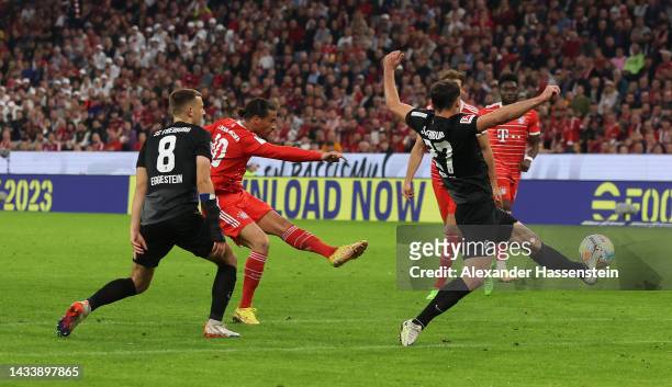 Leroy Sane of Bayern Munich scores their team's third goal during the Bundesliga match between FC Bayern München and Sport-Club Freiburg at Allianz...