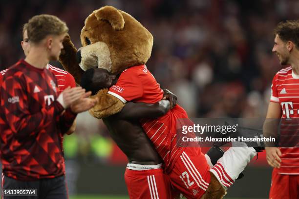Sadio Mane of Bayern Munich and Berny the Mascot interact after the Bundesliga match between FC Bayern München and Sport-Club Freiburg at Allianz...