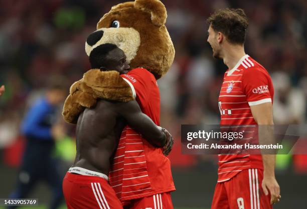 Sadio Mane of Bayern Munich and Berny the Mascot interact after the Bundesliga match between FC Bayern München and Sport-Club Freiburg at Allianz...