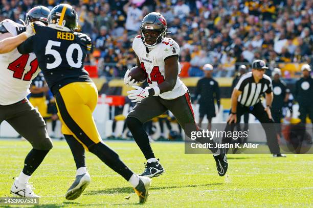 Chris Godwin of the Tampa Bay Buccaneers runs with the ball after a reception against the Pittsburgh Steelers at Acrisure Stadium on October 16, 2022...