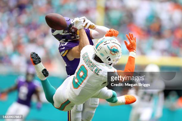 Noah Igbinoghene of the Miami Dolphins breaks up a pass intended for Adam Thielen of the Minnesota Vikings during the second half at Hard Rock...