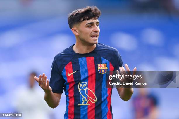 Pedri of FC Barcelona looks on wearing the modified OVO owl logo on the front of the FC Barcelona shirt, which celebrates Canadian musician Drake...