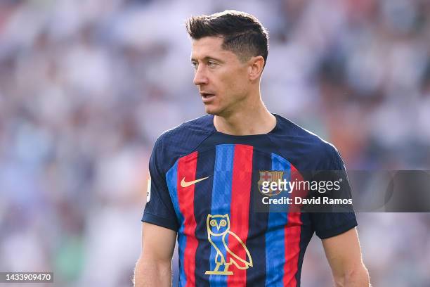 Robert Lewandowski of FC Barcelona looks on wearing the modified OVO owl logo on the front of the FC Barcelona shirt, which celebrates Canadian...