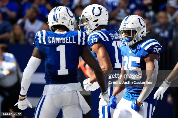 Deon Jackson of the Indianapolis Colts celebrates a touchdown against the Jacksonville Jaguars during the third quarter at Lucas Oil Stadium on...