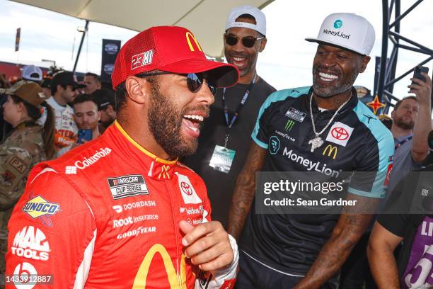 Bubba Wallace, driver of the McDonald's Toyota, speaks with former NBA player and "All the Smoke" host Stephen Jackson at the 1948 Club prior to the...