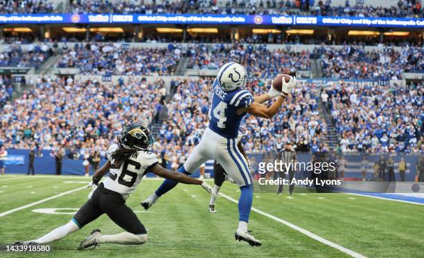 Alec Pierce of the Indianapolis Colts catches a pass for a touchdown against Shaquill Griffin of the Jacksonville Jaguars during the fourth quarter...