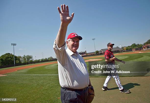 Republican presidential candidate, former Speaker of the House Newt Gingrich walks with Gardner-Webb University baseball coach Rusty Stroupe prior to...