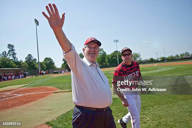 Republican presidential candidate, former Speaker of the House Newt Gingrich walks with Gardner-Webb University baseball coach Rusty Stroupe prior to...