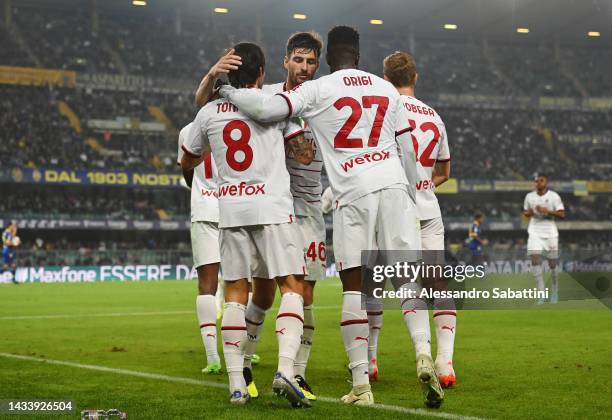 Sandro Tonali of AC Milan celebrates with teammates after scoring their team's second goal during the Serie A match between Hellas Verona and AC...