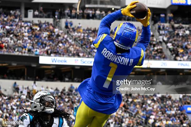 Allen Robinson II of the Los Angeles Rams catches a touchdown pass over Donte Jackson of the Carolina Panthers in the second quarter of a game at...