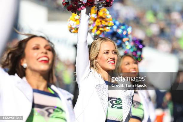 Members of the Seattle Seahawks cheerleaders perform against the Arizona Cardinals during the first half at Lumen Field on October 16, 2022 in...