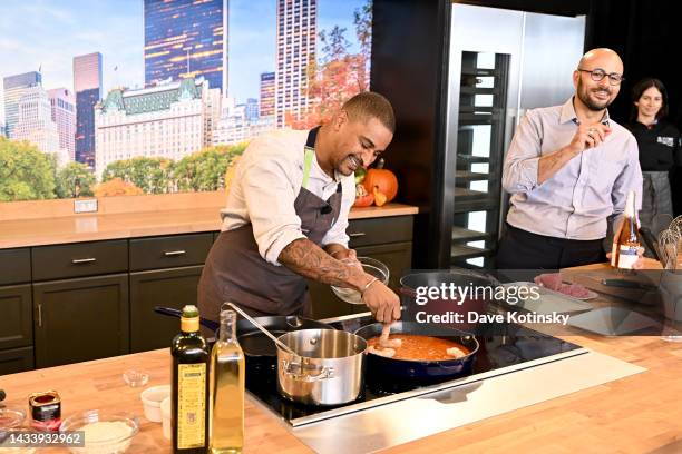 Carlton McCoy and JJ Johnson make a culinary presentation during at the Food Network New York City Wine & Food Festival presented by Capital One -...