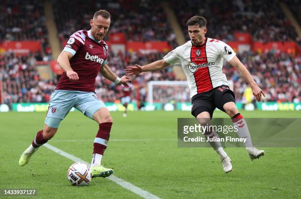 Vladimir Coufal of West Ham United is challenged by Romain Perraud of Southampton during the Premier League match between Southampton FC and West Ham...