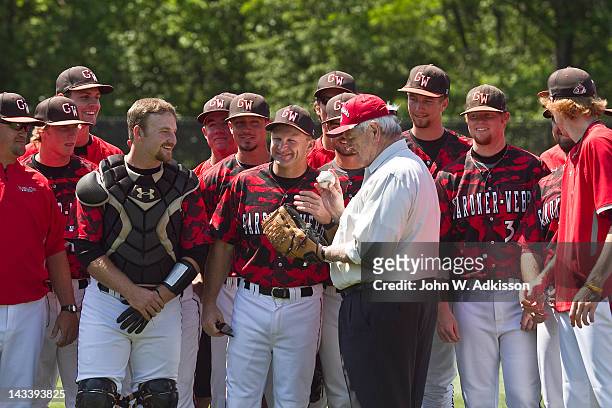 Republican presidential candidate, former Speaker of the House Newt Gingrich stands with Gardner-Webb University baseball players prior to throwing...