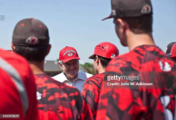 Republican presidential candidate, former Speaker of the House Newt Gingrich talks with Gardner-Webb University baseball players prior to throwing...