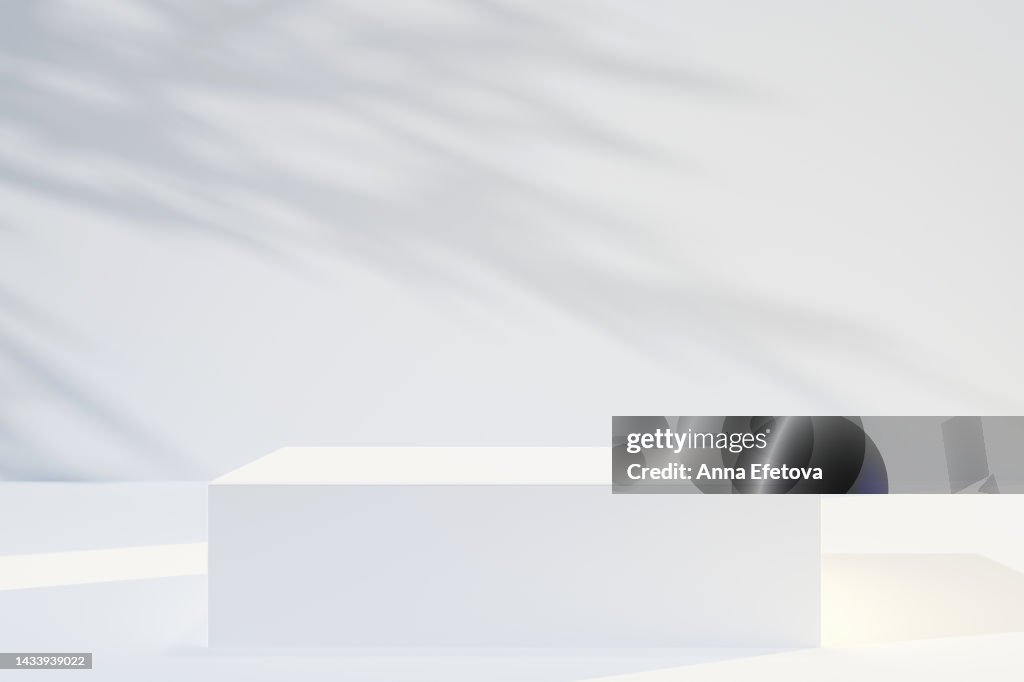 Cube shape white podium on white background with many plant shadows. Perfect platform for showing your products. Three dimensional illustration