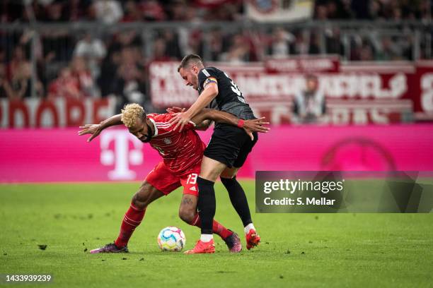 Eric Maxim Choupo-Moting of FC Bayern Muenchen challenges for the ball during the Bundesliga match between FC Bayern München and Sport-Club Freiburg...