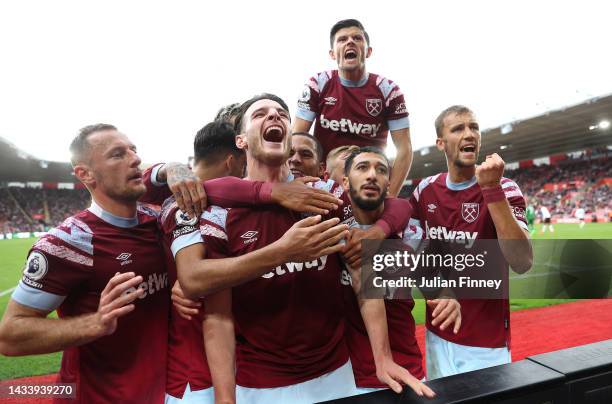 Declan Rice of West Ham United celebrates after scoring their side's first goal during the Premier League match between Southampton FC and West Ham...