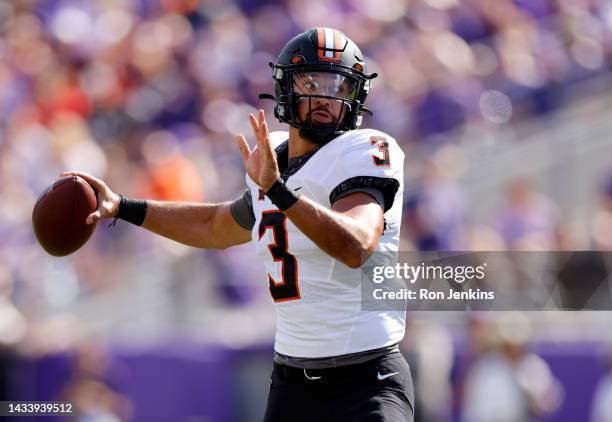 Spencer Sanders of the Oklahoma State Cowboys throws against the TCU Horned Frogs during the first half at Amon G. Carter Stadium on October 15, 2022...