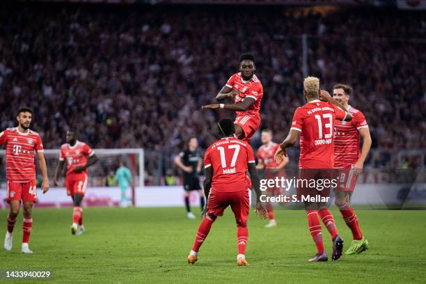 Alphonso Davies of FC Bayern Muenchen celebrates the goal during the Bundesliga match between FC Bayern München and Sport-Club Freiburg at Allianz...