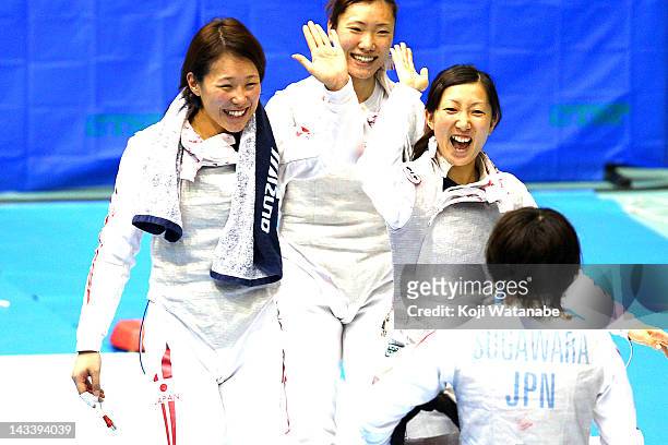 Siho Nishioka and Kyomi Hirata and Chie Yoshizawa and Chieko Sugawara of Japan celebrates the win after in the Women's Foil Team Tableau of 4 on day...