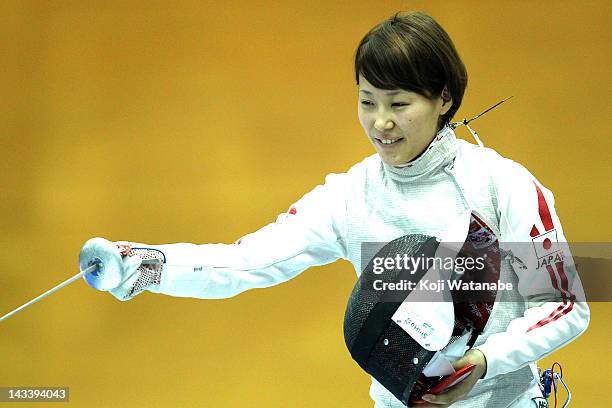 Siho Nishioka of Japan looks on in the Women's Foil Team Tableau of 8 on day four of the 2012 Asian Fencing Championships at Wakayama Big Wave on...